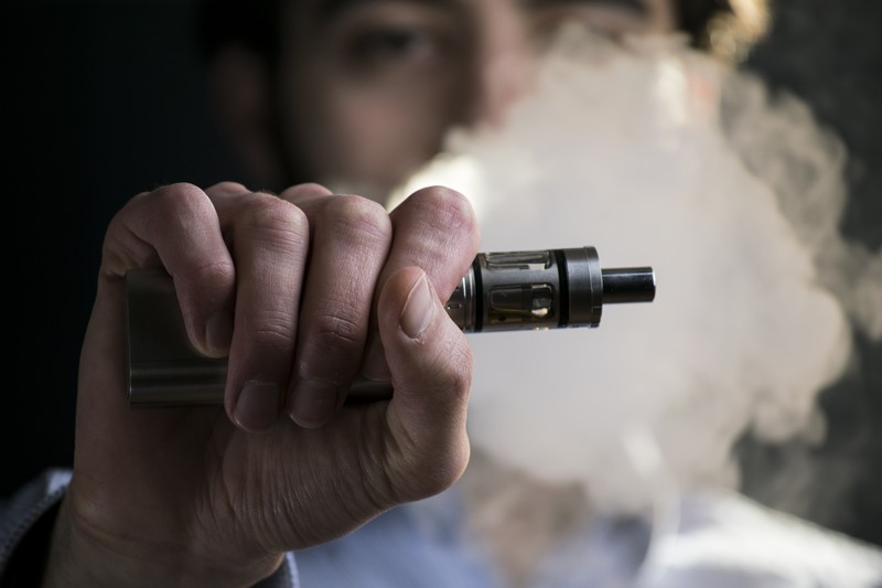 Interior of a modern, well-stocked vape retail shop